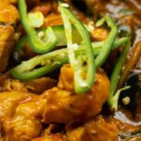 Chicken Curry · Chicken cooked with mild north Indian curry sauce.