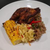 ¼ Jerk Chicken Fried Rice · Pot fried rice, grilled corn on cob fried cabbage and plantains.