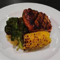 Grilled Salmon & Seafood Mash Potatoes · Seafood mashed potatoes with crab meat, charred broccoli & grilled corn on the cob.
