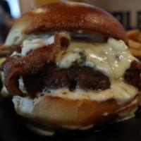 Bacon Blue Burger · Thick cut bacon and Blue cheese.

Hamburgers are cooked to order. Consuming raw or undercook...