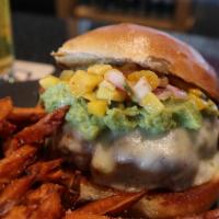 California Burger · Homemade guacamole, Pepper Jack cheese and mango salsa.

Hamburgers are cooked to order. Con...