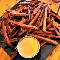 Fresh Cut Sweet Potato Fries · Served with sweet chili lime sauce.
