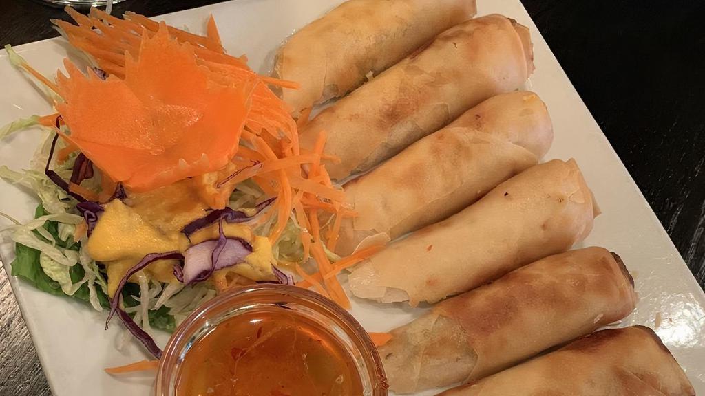 Thai Spring Roll · Favorite. Popular crispy spring roll wrapped with chicken, vegetables, chopped scallions, and coriander. Served with special turnip sauce.