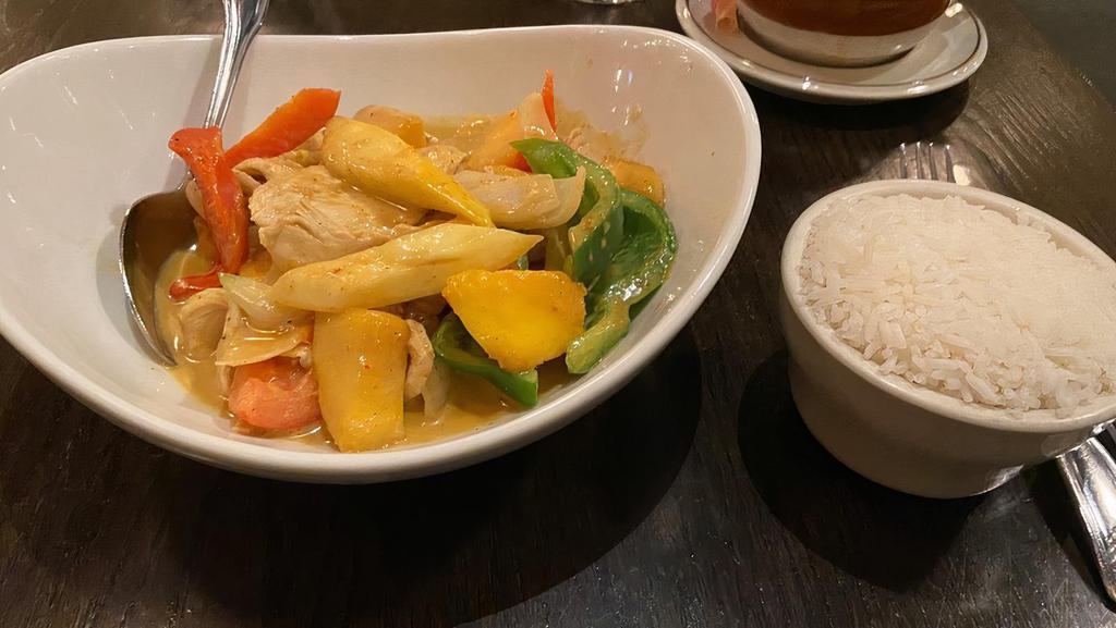 Brown Sugar Mango Curry · Ripe fresh diced of mango simmered with slices tender chicken in a yellow curry base brightened with tomatoes, green and red peppers, onions, and crispy summer squash.