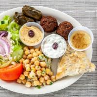 Vegetarian Platter · An assortment platter with spanakopita, chick peas, falafel & pita bread, served with Greek ...