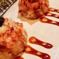 Basketball · Sushi rice tempura topped with spicy tuna, cucumber, tobiko, and eel sauce.