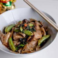 Drunken Noodles · Fresh local rice noodles, broccoli, mushrooms, squash, snap peas, Thai basil, ginger, garlic...
