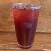 Iced Spiced Hibiscus Tea · Refreshingly tart and sweetened. Made with hibiscus flowers, cloves and allspice. Caffeine-f...