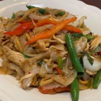 Drunken Noodle · Stir-fried at noodle, bamboo shoot, onions, tomato, pepper, carrot, string bean with spicy b...