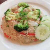 House Fried Rice · Fried rice with choice of meat with onions, scallion, pea, egg and carrot.