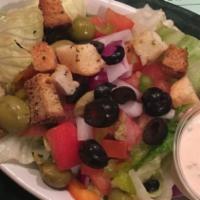 House Salad · Fresh lettuce mix with tomato, celery, cucumber, carrots, cheddar, olives, and croutons. You...