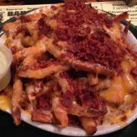 Loaded Fries · Melted mixed cheese, bacon bits, and our signature avocado ranch dressing.