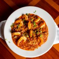 Jambalaya · Homemade with our New Orleans recipe. Sweet and hot sausage, ham, onions, peppers, spicy cre...