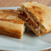 Chicken Ranch  · Grilled chicken breast, bacon, tomatoes, provolone and ranch dressing.