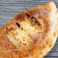 Large Chicago-Style Stromboli  · Our sauce, mozzarella, steak, pepperoni, grilled onions, green peppers and mushrooms.