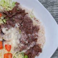 Cheesesteak Bowl · Grilled steak, American cheese, lettuce, tomatoes on top of a bed of rice.