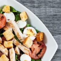 Spinach And Grilled Chicken Salad Tray · Baby spinach fresh tomatoes chicken hard-boiled egg bacon and croutons.