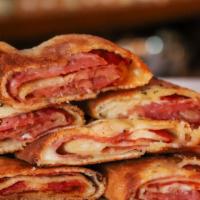 Pepperoni Stromboli · Provolone cheese and pepperoni. Served with a side of marinara.