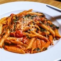Penne Alla Vodka · Spinach, cherry tomatoes served in a vodka blush sauce.