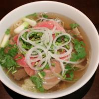 Pho Dac Biet · Special pho with rare steak, well-done flank, fat brisket, tendon, and tripe.