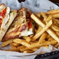 Grilled Chicken · Grilled chicken, roasted red pepper, sun dried tomatoes, provolone and pesto on focaccia.