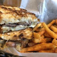 Grilled Steak & Cheese · Thin sliced flank steak, provolone and grilled onions on focaccia.