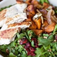 Roasted Butternut Harvest Salad · Roasted butternut squash, caramelized onion, toasted pecans, dried cranberries on our balsam...