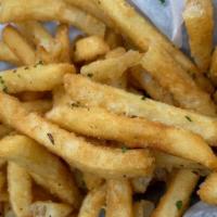 Truffle Fries · Our fries with herbs and light truffle salt.