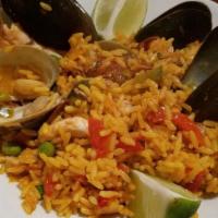 Paella Mixta · Saffron rice, chicken, chorizo, clams, mussels, calamari and shrimp.