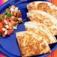 Bacon Quesadilla · Bacon quesadilla with fried tomato, cheese, red onion, sour cream and salsa.