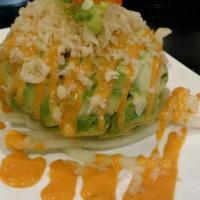 Avocado Ball · Spicy crab, yellowtail, tuna, and salmon wrapped in avocado ball.
