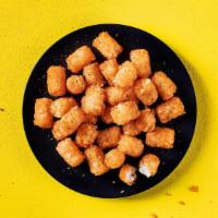 Fried Tots · Perfectly crispy, seasoned potato tots.