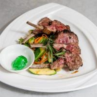 Rack Of Lamb · Marinade with rosemary, thyme, black pepper, and seasonal vegetables