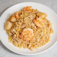 Seafood Fried Rice · Gluten free and spicy.  Jumbo shrimp,  scallops and crabmeat.