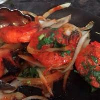Tandoori Shrimp · Jumbo shrimp pieces marinated and cooked in the tandoor with traditional Indian spices and m...