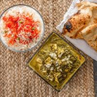 Palak Paneer · Chunks of Indian cottage cheese in a pureed spinach sauce with a blend of Indian spices topp...