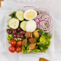 House Garden Salad · Iceberg lettuce or spinach, tomatoes, cucumbers, onions, green peppers and croutons.