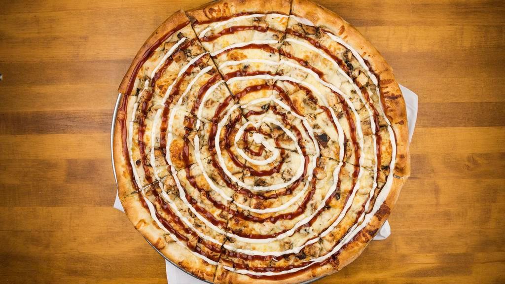 Bbq Chicken Pizza · Tangy BBQ sauce, grilled chicken and cheese.
