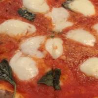 Margherita · Tomato sauce, fresh Mozzarella, basil.