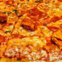Buffalo Chicken · Buffalo chicken strips, homemade pizza sauce and mozzarella cheese with a side of bleu cheese.