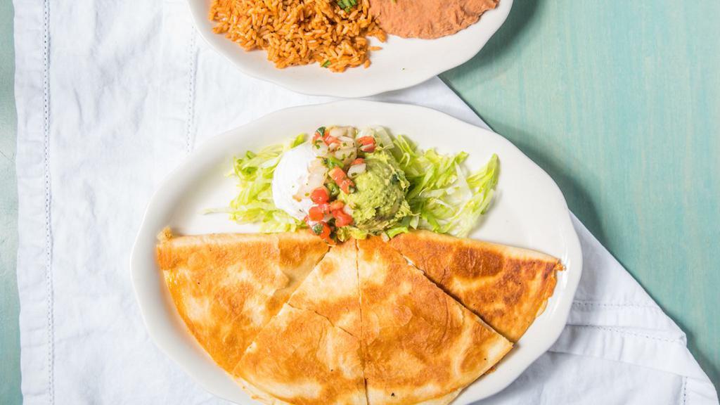 Quesadillas · Flour tortilla, cheese, sour crème, pico De gallo. Choice of grilled chicken, carnitas, pastor, chorizo, chicken tinga, vegetable.