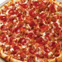 Meat Magnifico Pizza · Pepperoni, ham, capicola, bacon, Italian sausage and mozzarella cheese are piled high atop o...