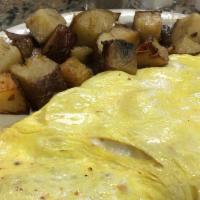 Southwestern Omelet · Hot peppers, ham, onions and cheddar cheese.