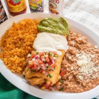 Chimichanga · Deep fried burrito. Choice of meat, rice, beans, cheese, guacamole, sour cream, lettuce and ...