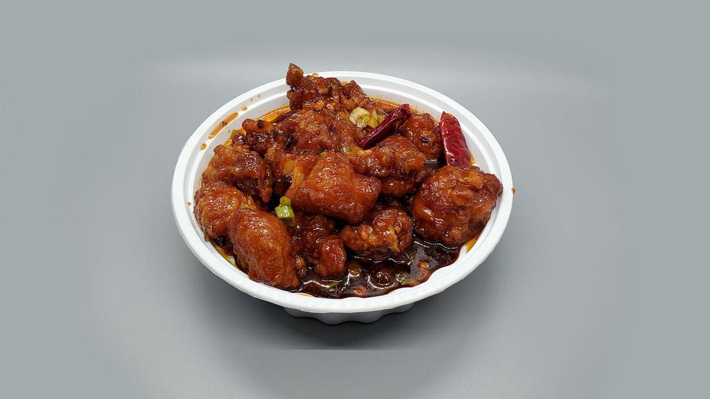 General Tso'S Chicken · Spicy. Boneless chicken dunks marinated and crispy fried. All are sautéed with scorched red peppers in our special sauce. With white rice.