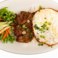 Rice, Grilled Pork & Eggs · White rice, grilled pork, 2 fried eggs.  Garnish with green onions and black pepper.  Sweete...