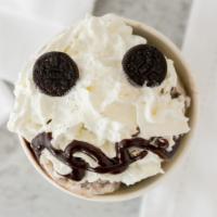 Cookie Monster · Hershey's cookies and creme with Oreo's and your choice of sauce.