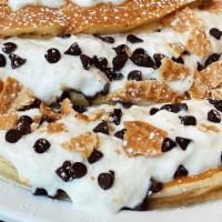 Cannoli Bettys · Two jumbo Bettys layered with sweet ricotta cream and chocolate chips, topped with cannoli c...