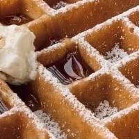 Belgian Waffle · Topped with powdered sugar.