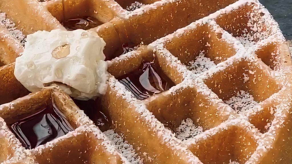 Belgian Waffle · Topped with powdered sugar.